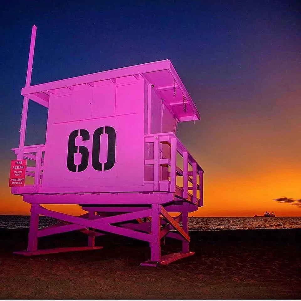 Pink Tower 60 lifeguard tower at dusk