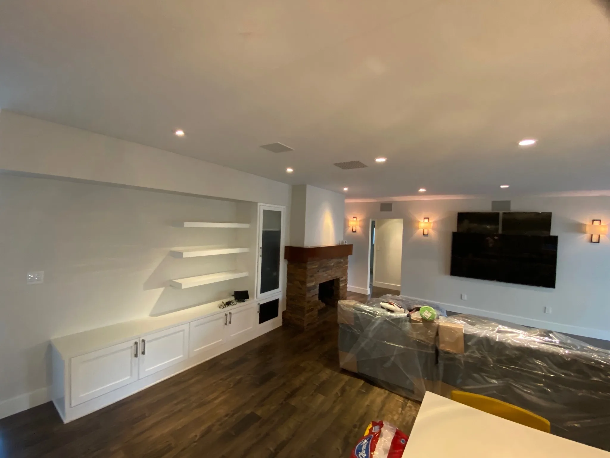 Living room with painted built-ins and fireplace